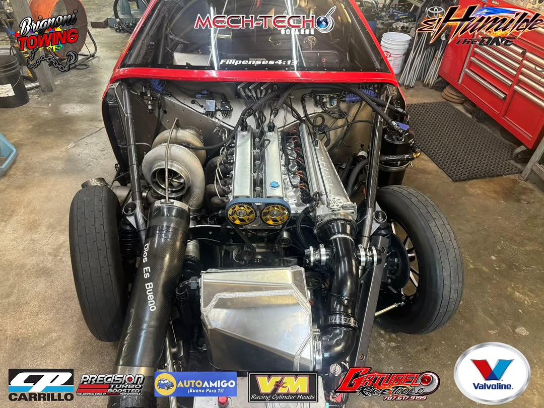 El Humilde 2JZ ProMod engine bay showing turbo and pressurization systems fabricated by Gatubelo Race Tools