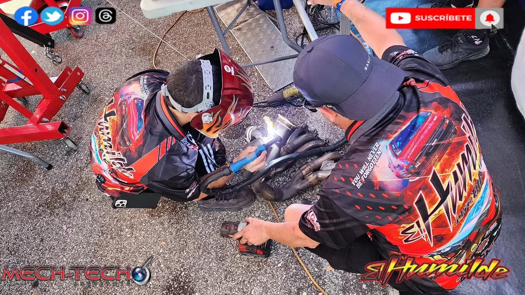 El Humilde crew welding trackside at the race